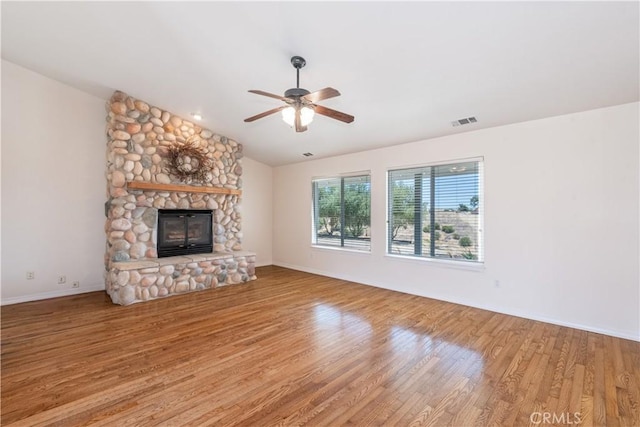 5335 Play Doe Ln, Paso Robles, CA 93446 - unfurnished living room with a fireplace, vaulted ceiling, a ceiling fan, and wood finished floors