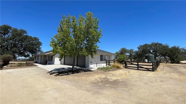5335 Play Doe Ln, Paso Robles, CA 93446 - view of front of property with driveway and an attached garage