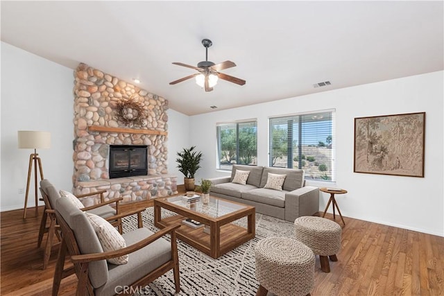 5335 Play Doe Ln, Paso Robles, CA 93446 - living room with vaulted ceiling, a ceiling fan, wood finished floors, and a stone fireplace