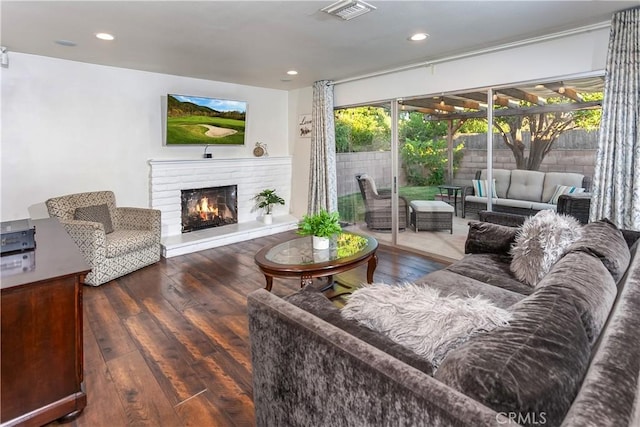 3640 Rosalie St, Simi Valley, CA 93063 - living room with hardwood / wood-style floors, a fireplace, and recessed lighting