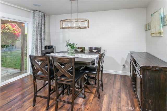 3640 Rosalie St, Simi Valley, CA 93063 - dining space featuring dark wood-style flooring and baseboards
