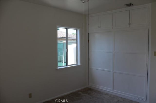 836 N 10th Ave, Upland, CA 91786 - unfurnished bedroom with carpet flooring and a closet