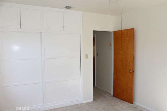 836 N 10th Ave, Upland, CA 91786 - unfurnished bedroom with a closet and light carpet