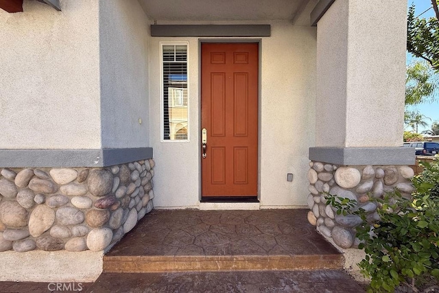 5612 Sprague Ave, Cypress, CA 90630 - doorway to property with stucco siding and stone siding