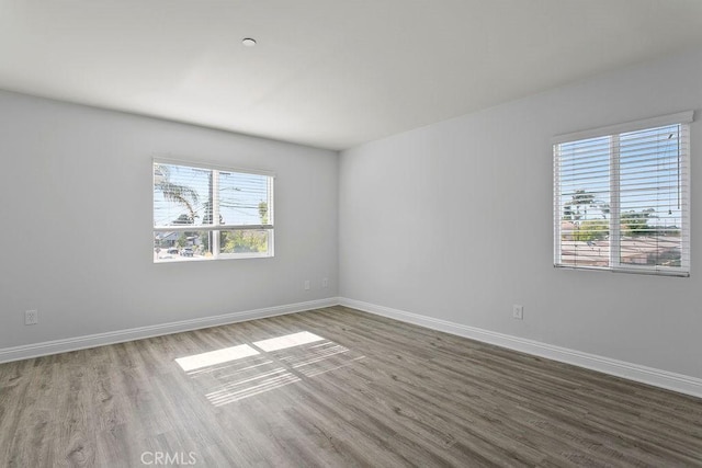 5612 Sprague Ave, Cypress, CA 90630 - spare room featuring wood finished floors and plenty of natural light