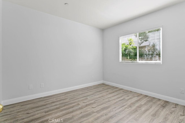5612 Sprague Ave, Cypress, CA 90630 - unfurnished room featuring wood finished floors and baseboards