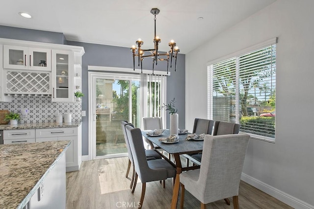 5612 Sprague Ave, Cypress, CA 90630 - dining area with a chandelier, light wood-type flooring, and recessed lighting