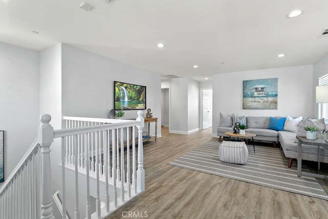 5612 Sprague Ave, Cypress, CA 90630 - living area with wood finished floors, recessed lighting, and plenty of natural light