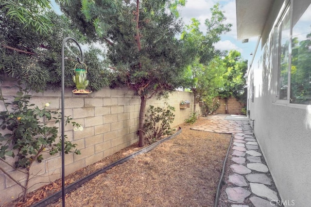5612 Sprague Ave, Cypress, CA 90630 - fenced backyard featuring a patio area
