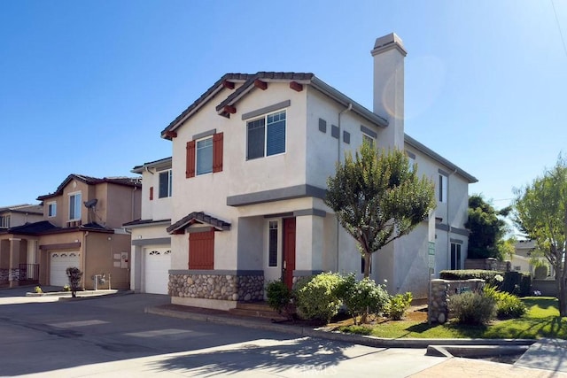 5612 Sprague Ave, Cypress, CA 90630 - mediterranean / spanish-style house with a garage, a chimney, stucco siding, concrete driveway, and stone siding