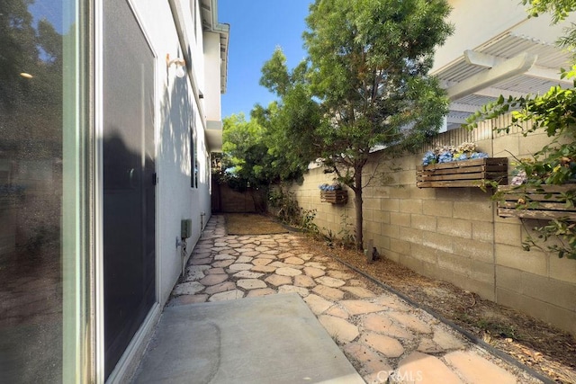 5612 Sprague Ave, Cypress, CA 90630 - fenced backyard featuring a patio area