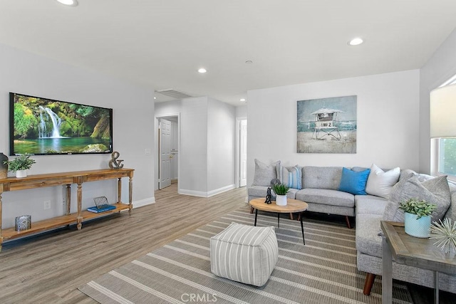 5612 Sprague Ave, Cypress, CA 90630 - living room featuring recessed lighting and wood finished floors