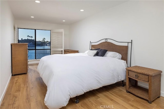 3871 Mistral Dr, Huntington Beach, CA 92649 - bedroom featuring light wood-style flooring and recessed lighting