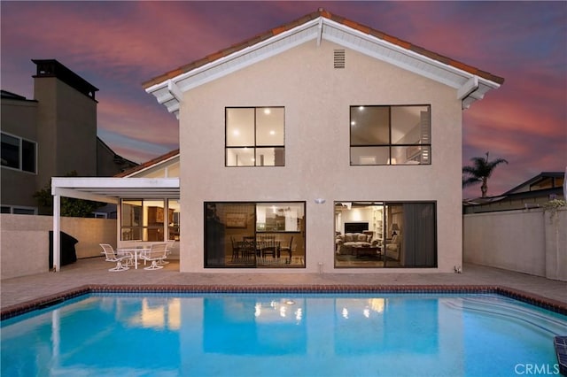 3871 Mistral Dr, Huntington Beach, CA 92649 - back of house with a patio and stucco siding