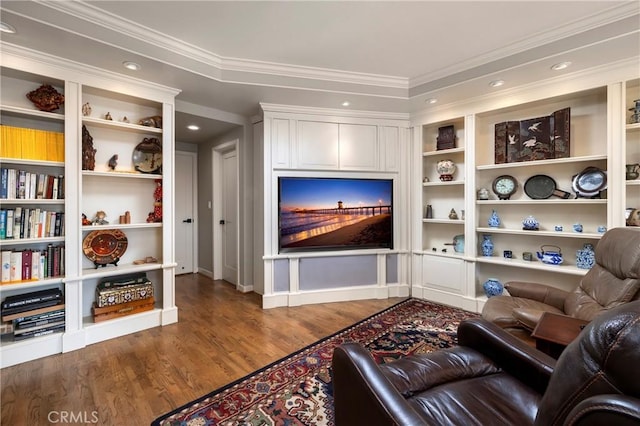 3871 Mistral Dr, Huntington Beach, CA 92649 - living area with wood finished floors, ornamental molding, built in shelves, and recessed lighting