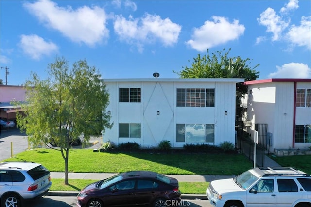10802 Palma Vista Ave, Garden Grove, CA 92840 - view of front facade featuring a front yard and uncovered parking