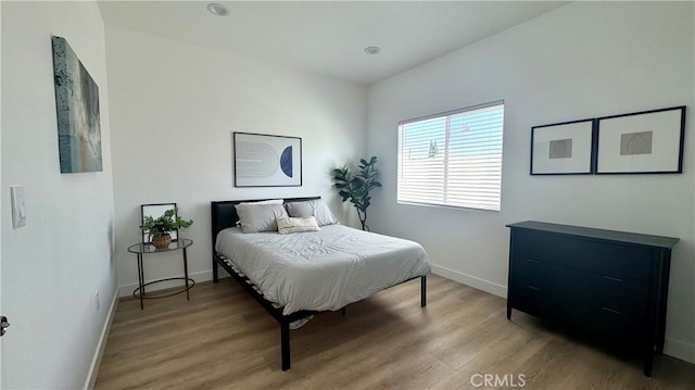 10802 Palma Vista Ave, Garden Grove, CA 92840 - bedroom with baseboards and light wood-style floors