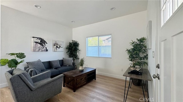 10802 Palma Vista Ave, Garden Grove, CA 92840 - living room with light wood-type flooring and recessed lighting