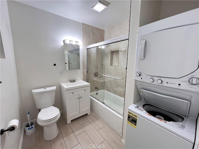 10802 Palma Vista Ave, Garden Grove, CA 92840 - full bath featuring estacked washer and dryer, vanity, and combined bath / shower with glass door