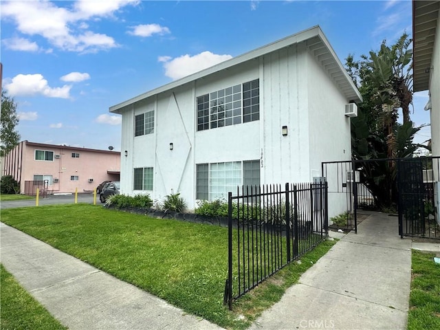 10802 Palma Vista Ave, Garden Grove, CA 92840 - view of side of home featuring stucco siding and a gate