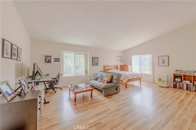 2201 Dublin Ln Unit 3, Diamond Bar, CA 91765 - bedroom featuring multiple windows, light wood-style floors, and lofted ceiling