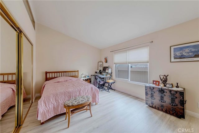 2201 Dublin Ln Unit 3, Diamond Bar, CA 91765 - bedroom featuring light wood finished floors, a closet, and lofted ceiling