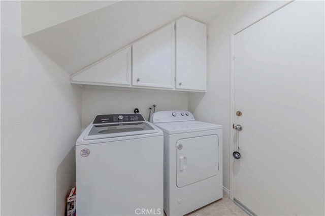 2201 Dublin Ln Unit 3, Diamond Bar, CA 91765 - laundry room with cabinet space, independent washer and dryer, and light tile patterned flooring