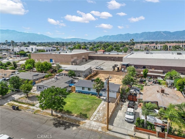 530 E 3rd St, Rialto, CA 92376 - aerial perspective of suburban area featuring a mountain backdrop