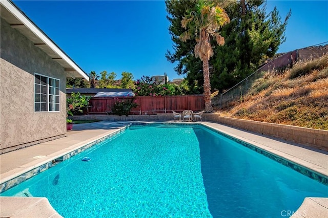 29639 Delphinium Ave, Canyon Country, CA 91387 - view of pool with a fenced backyard and a patio area