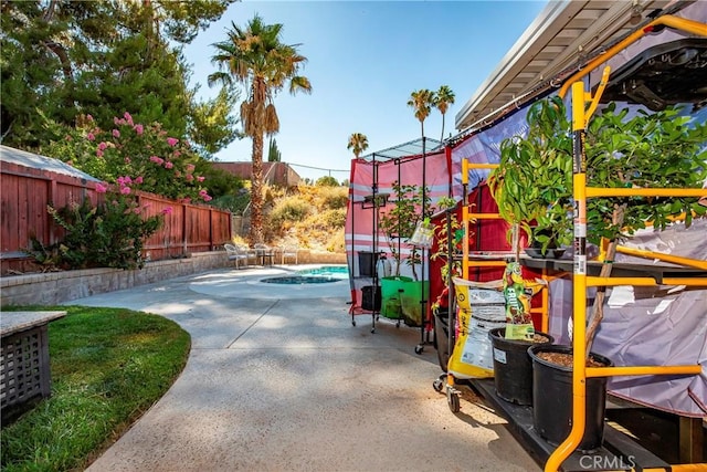 29639 Delphinium Ave, Canyon Country, CA 91387 - view of play area with a fenced backyard and a patio