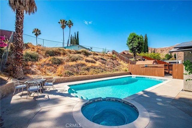 29639 Delphinium Ave, Canyon Country, CA 91387 - view of pool with a pool with connected hot tub, a patio, and outdoor dining space