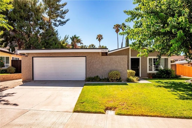 29639 Delphinium Ave, Canyon Country, CA 91387 - mid-century inspired home with concrete driveway, stucco siding, and a garage