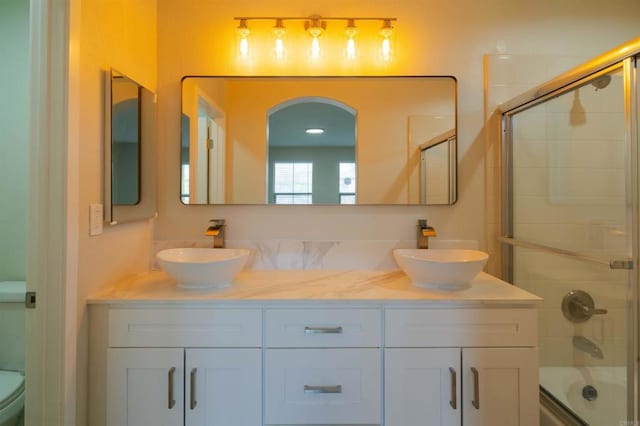 1295 Haglar Unit 1, Chula Vista, CA 91913 - full bathroom with double vanity and enclosed tub / shower combo