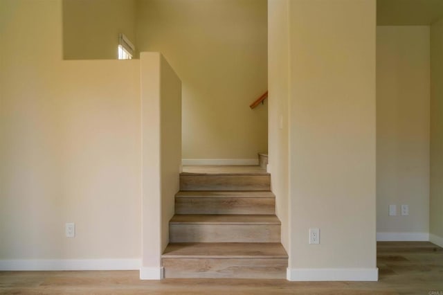 1295 Haglar Unit 1, Chula Vista, CA 91913 - staircase featuring wood finished floors and baseboards