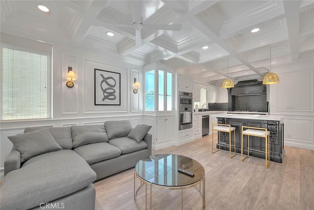 16549 Celadon Ct, Chino Hills, CA 91709 - living area with a decorative wall, coffered ceiling, beamed ceiling, light wood-style floors, and a ceiling fan