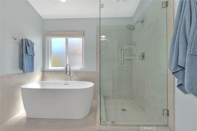16549 Celadon Ct, Chino Hills, CA 91709 - full bath with a freestanding tub, a shower stall, and tile walls