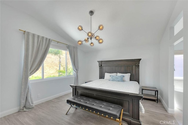 16549 Celadon Ct, Chino Hills, CA 91709 - bedroom with lofted ceiling, a chandelier, and light wood finished floors