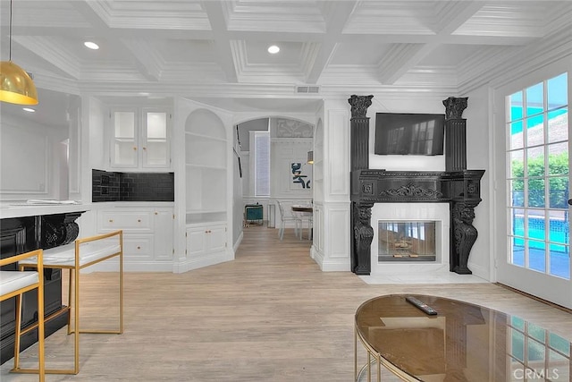 16549 Celadon Ct, Chino Hills, CA 91709 - living room with coffered ceiling, ornamental molding, light wood-type flooring, a premium fireplace, and beam ceiling