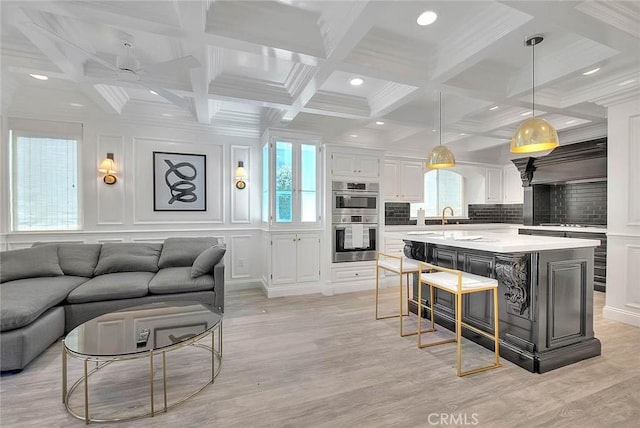 16549 Celadon Ct, Chino Hills, CA 91709 - living room featuring beam ceiling, light wood-type flooring, recessed lighting, coffered ceiling, and ceiling fan