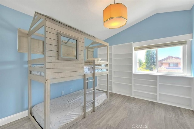 16549 Celadon Ct, Chino Hills, CA 91709 - bedroom featuring wood finished floors and vaulted ceiling