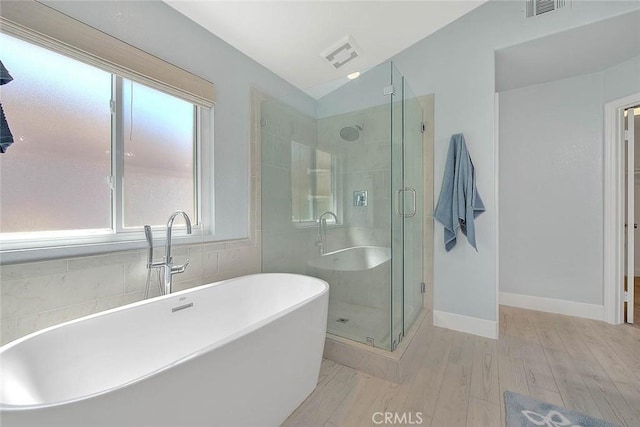 16549 Celadon Ct, Chino Hills, CA 91709 - bathroom with a freestanding tub, wood finished floors, and a shower stall