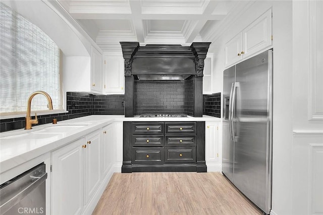 16549 Celadon Ct, Chino Hills, CA 91709 - kitchen with stainless steel appliances, white cabinetry, backsplash, light countertops, and coffered ceiling