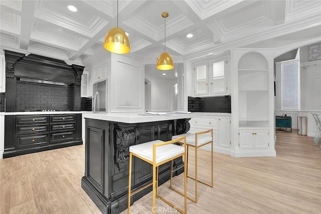 16549 Celadon Ct, Chino Hills, CA 91709 - kitchen with dark cabinetry, white cabinetry, light countertops, custom exhaust hood, and light wood-type flooring