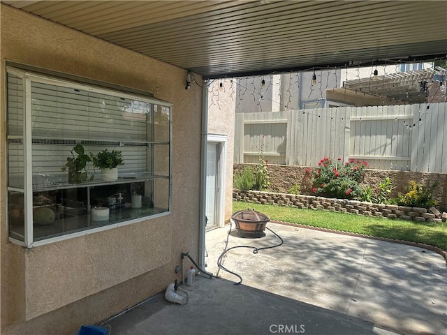 10600 Silverleaf Cir, Moreno Valley, CA 92557 - view of patio with an outdoor fire pit