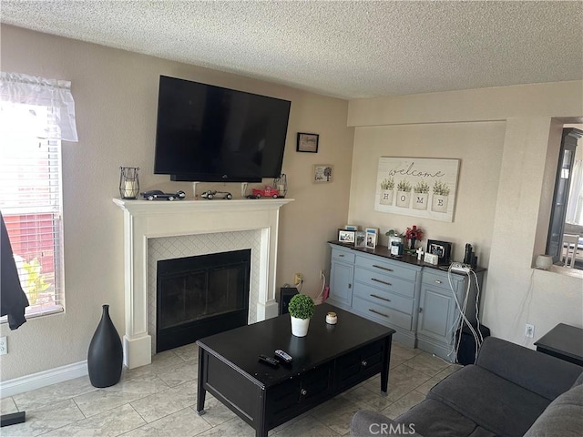 10600 Silverleaf Cir, Moreno Valley, CA 92557 - living room with a tile fireplace and a textured ceiling