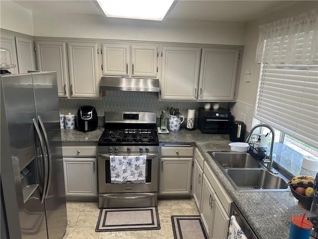 10600 Silverleaf Cir, Moreno Valley, CA 92557 - kitchen with appliances with stainless steel finishes, under cabinet range hood, gray cabinetry, and light tile patterned flooring