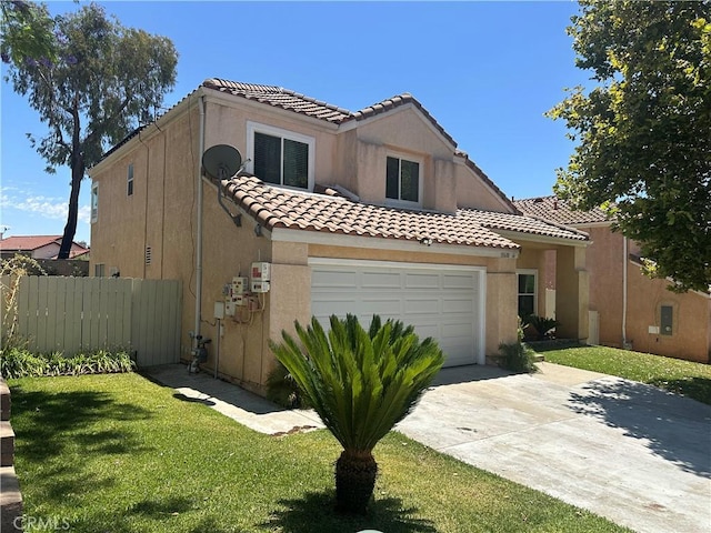 10600 Silverleaf Cir, Moreno Valley, CA 92557 - mediterranean / spanish house featuring driveway, a tile roof, stucco siding, and an attached garage