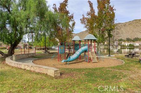 10600 Silverleaf Cir, Moreno Valley, CA 92557 - communal playground with a lawn and a mountain view