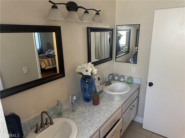 10600 Silverleaf Cir, Moreno Valley, CA 92557 - full bathroom with double vanity and tile patterned floors