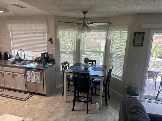 10600 Silverleaf Cir, Moreno Valley, CA 92557 - dining room featuring ceiling fan and a textured ceiling